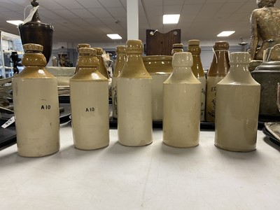 Lot 230 - A collection of 19th Century stoneware bottles and jars