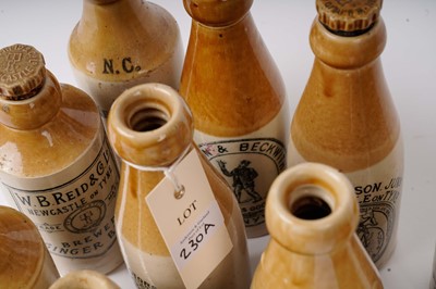 Lot 230 - A collection of 19th Century stoneware bottles and jars