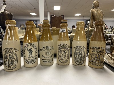 Lot 230 - A collection of 19th Century stoneware bottles and jars