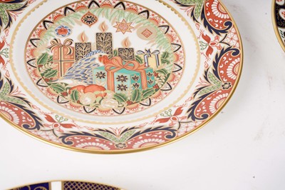 Lot 245 - A collection of Royal Crown Derby limited edition decorative Christmas plates