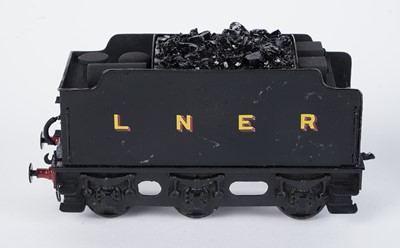 Lot 145 - A metal kit-built 0-gauge 0-6-0 locomotive and six-wheel tender