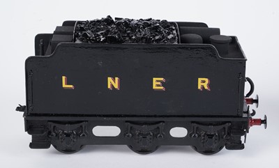 Lot 145 - A metal kit-built 0-gauge 0-6-0 locomotive and six-wheel tender