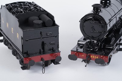 Lot 145 - A metal kit-built 0-gauge 0-6-0 locomotive and six-wheel tender