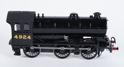 Lot 145 - A metal kit-built 0-gauge 0-6-0 locomotive and six-wheel tender