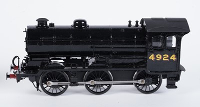 Lot 145 - A metal kit-built 0-gauge 0-6-0 locomotive and six-wheel tender