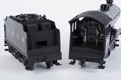 Lot 145 - A metal kit-built 0-gauge 0-6-0 locomotive and six-wheel tender