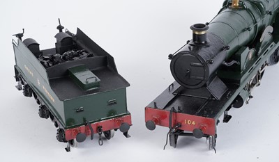 Lot 169 - A metal kit-built 0-gauge 4-4-2 locomotive and six-wheel tender