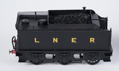 Lot 190 - A metal kit-built 0-gauge 4-4-2 locomotive and six-wheel tender