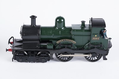 Lot 243 - A metal kit-built 0-gauge 4-4-0 locomotive and six-wheel tender