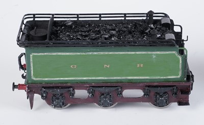 Lot 244 - A metal kit-built 0-gauge 4-4-2 locomotive and six-wheel tender