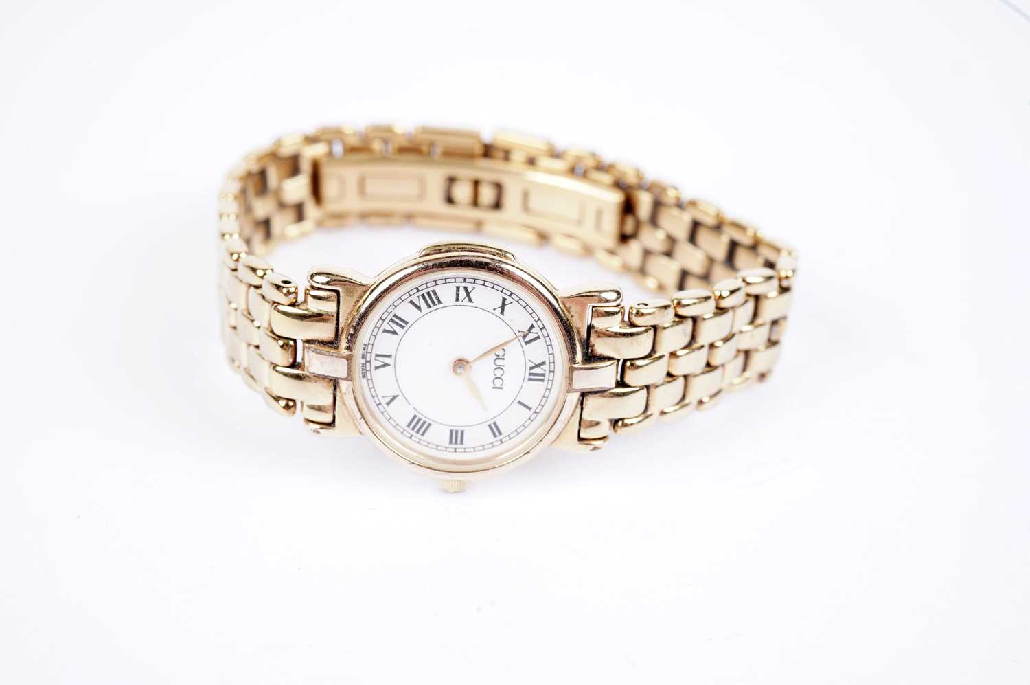 Lot 671 - A lady's Gucci 3400L series gold plated