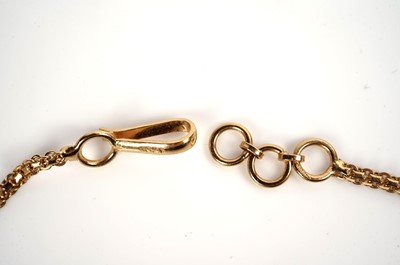 Lot 1255 - An Indian high carat yellow gold necklace and matching earrings