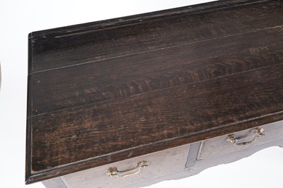 Lot 70 - A George III oak dresser base