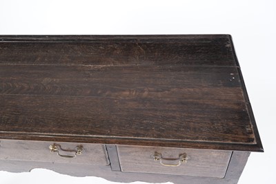 Lot 70 - A George III oak dresser base