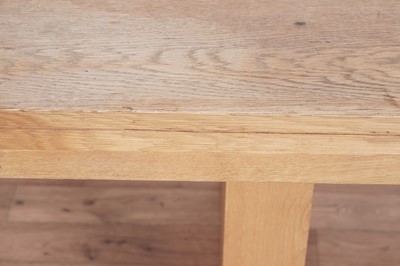 Lot 37 - A contemporary eight-piece oak dining room suite