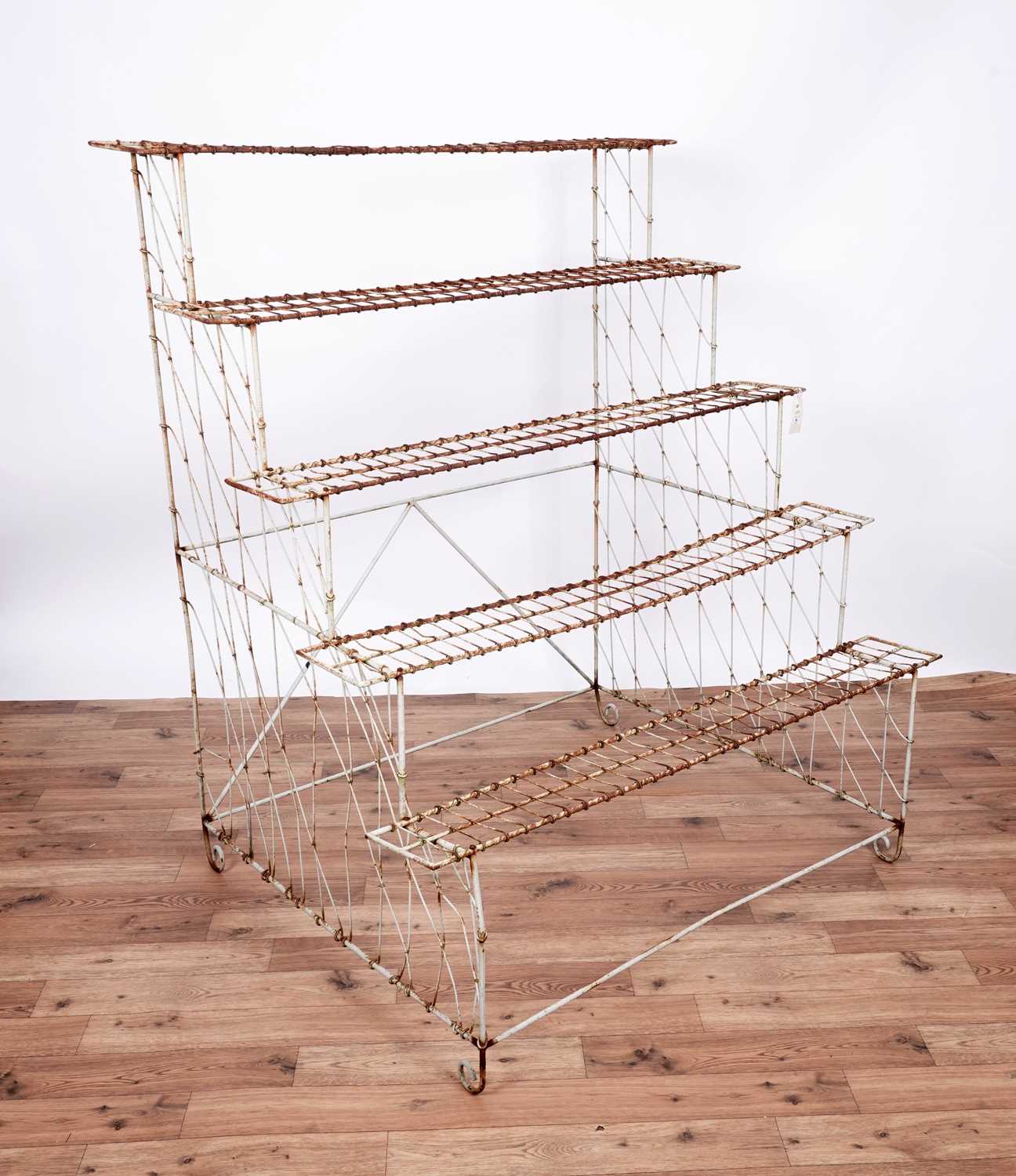 Lot 9 - A vintage wirework shop plant display stand