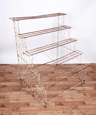 Lot 9 - A vintage wirework shop plant display stand