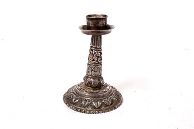 Lot 1424 - An early 20th Century Indian silver dwarf candlestick; and other items