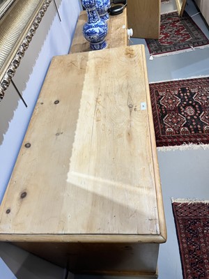 Lot 25 - A Victorian stripped pine chest of drawers