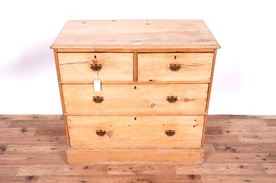 Lot 25 - A Victorian stripped pine chest of drawers