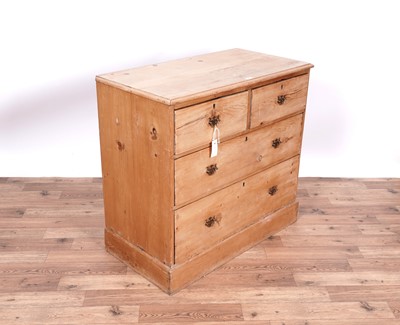 Lot 25 - A Victorian stripped pine chest of drawers