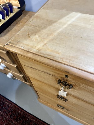 Lot 25 - A Victorian stripped pine chest of drawers