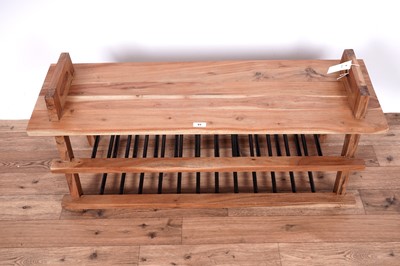 Lot 23 - A stylish hardwood shoe rack