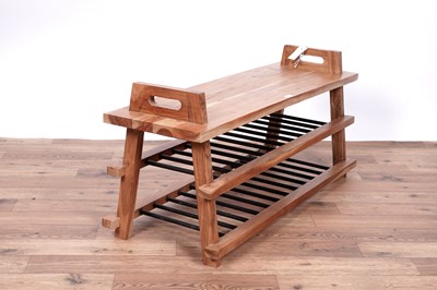 Lot 23 - A stylish hardwood shoe rack