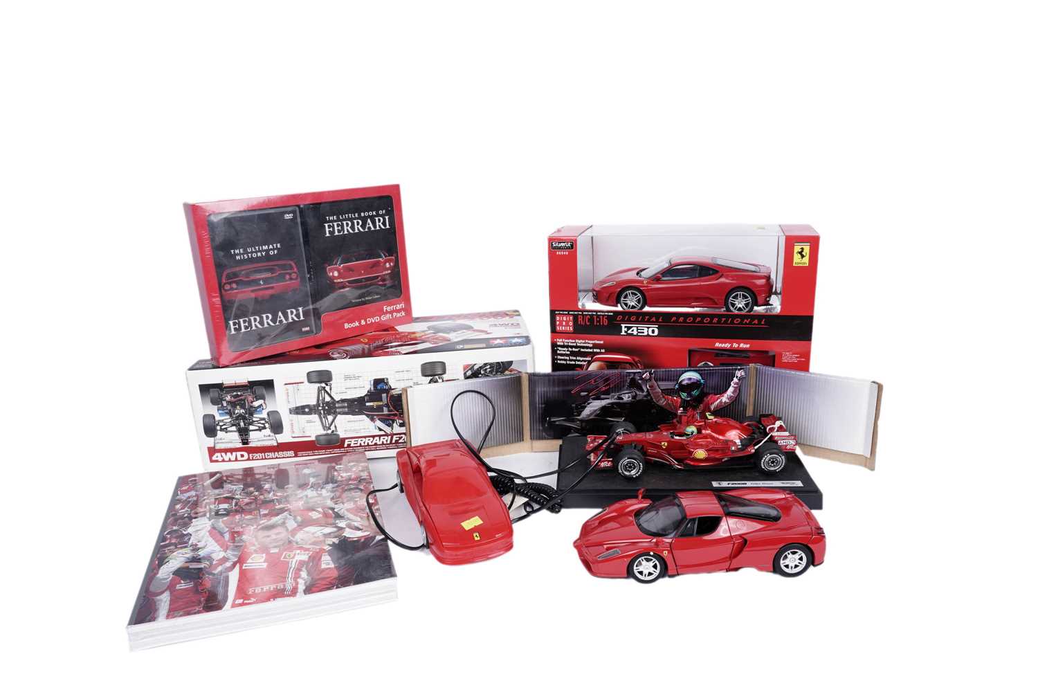 Lot 169 - A Tamiya Ferrari F2001 radio controlled car; and other Ferrari collectibles