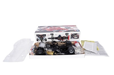 Lot 169 - A Tamiya Ferrari F2001 radio controlled car; and other Ferrari collectibles
