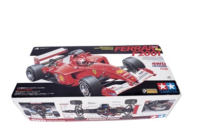 Lot 169 - A Tamiya Ferrari F2001 radio controlled car; and other Ferrari collectibles