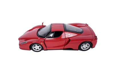 Lot 169 - A Tamiya Ferrari F2001 radio controlled car; and other Ferrari collectibles