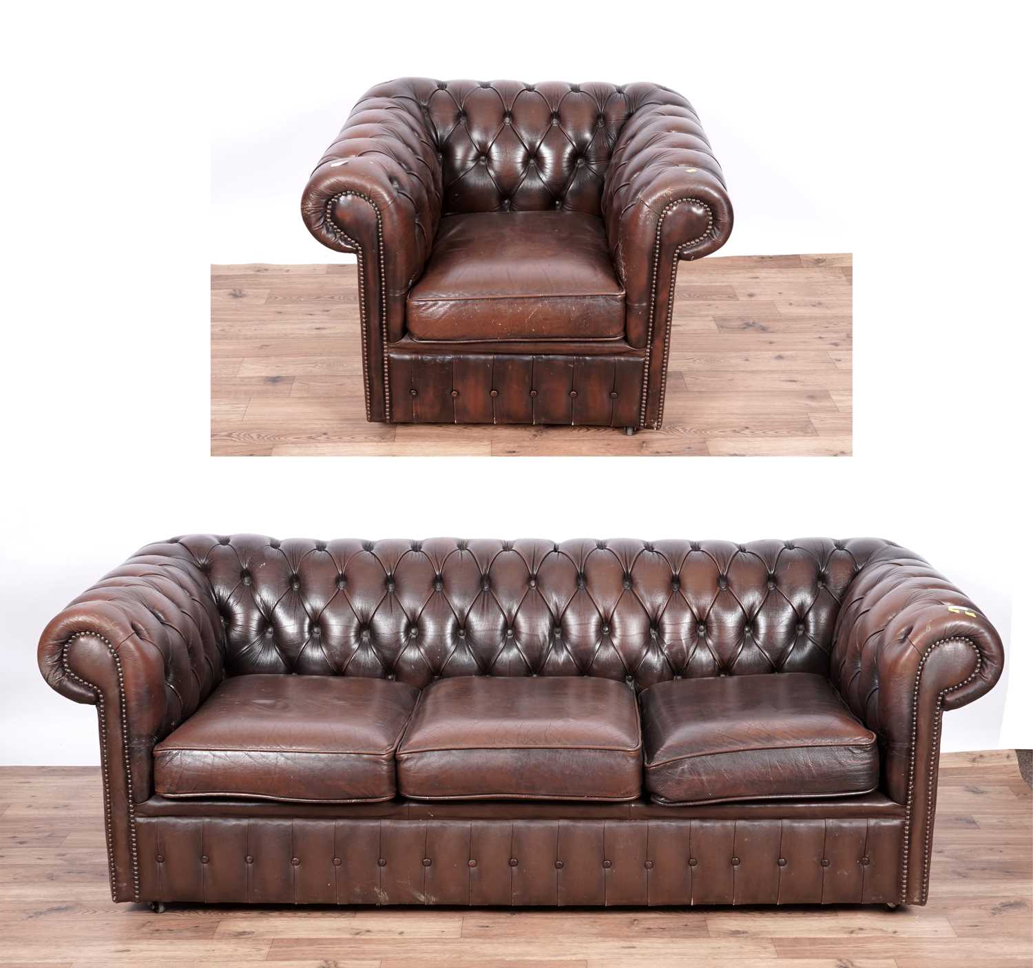 Lot 17 - A Chesterfield style sofa and armchair