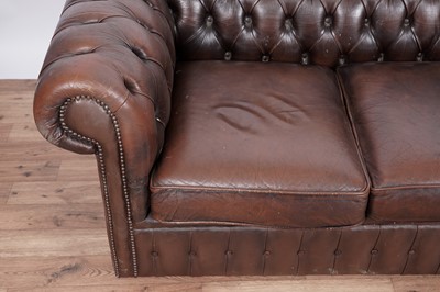Lot 17 - A Chesterfield style sofa and armchair