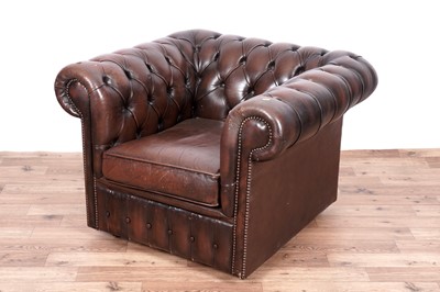 Lot 17 - A Chesterfield style sofa and armchair