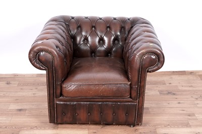 Lot 17 - A Chesterfield style sofa and armchair