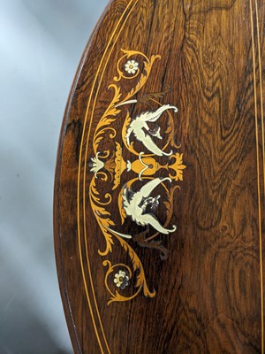 Lot 62 - An Edwardian inlaid rosewood triangular drop leaf occasional table