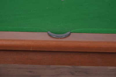 Lot 78 - A mahogany pool dining table