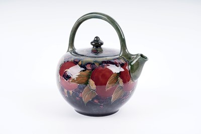 Lot 925 - A William Moorcroft three-piece tea set