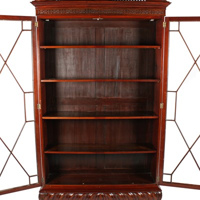 Lot 498 - An Irish mahogany Chippendale style cabinet bookcase