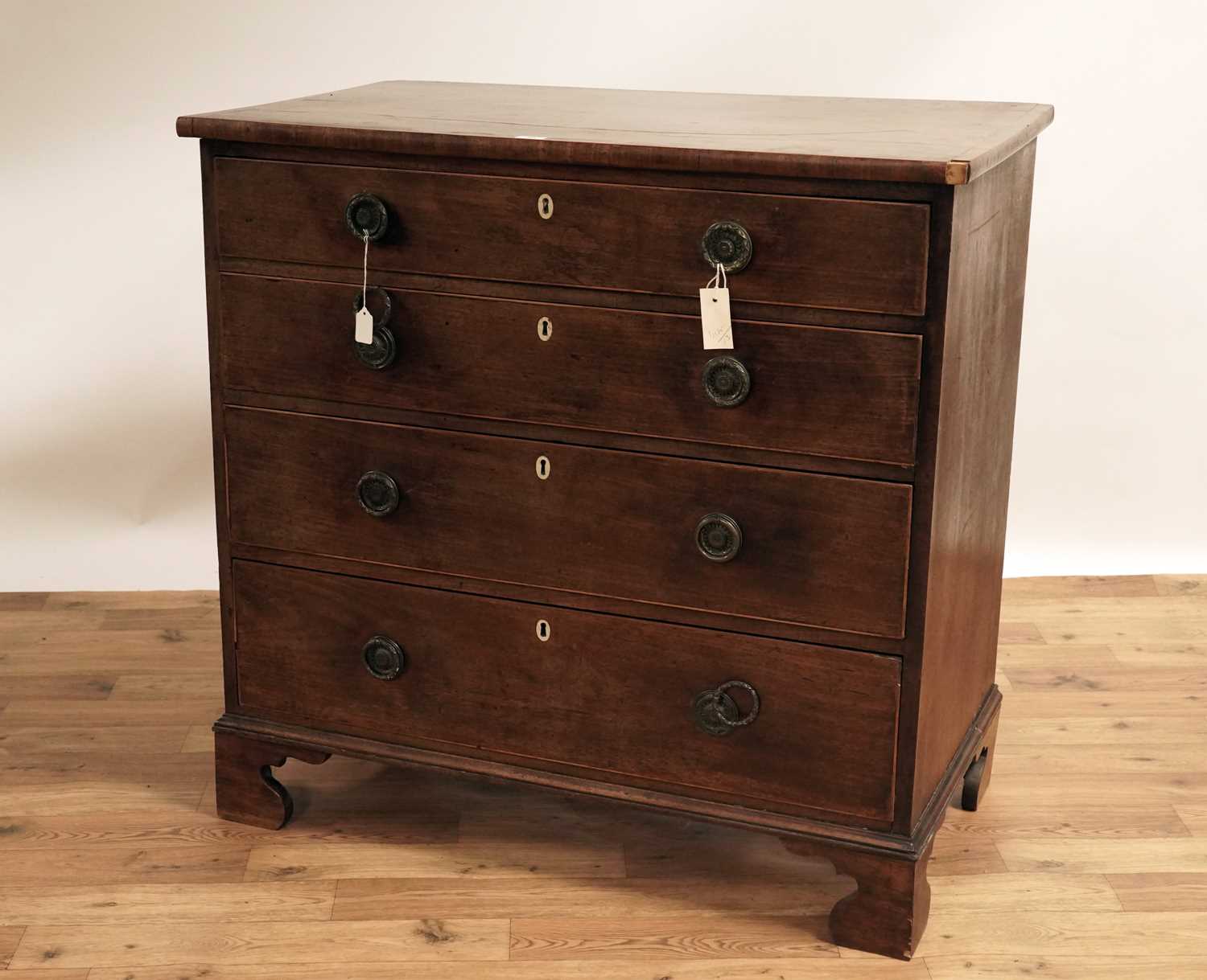 Lot 95 - A George III inlaid mahogany chest of drawers
