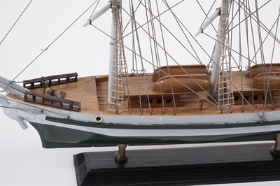 Lot 620 - A collection of four modern wooden model Barques