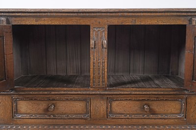 Lot 38 - Attributed to Titchmarsh and Goodwin: a Jacobean style carved oak buffet