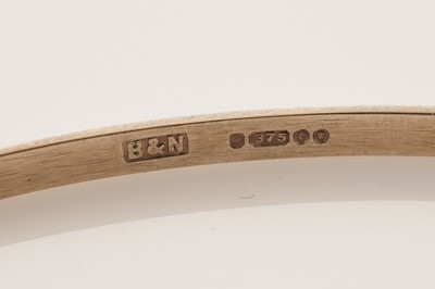 Lot 11 - A set of four 9ct yellow gold bangles