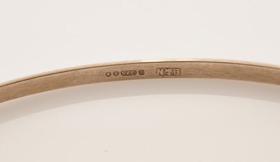 Lot 11 - A set of four 9ct yellow gold bangles