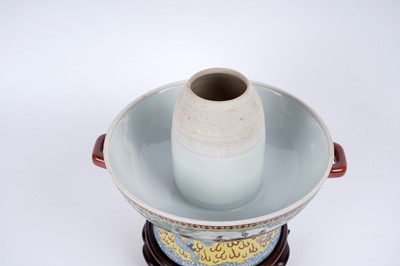 Lot 873 - A Chinese rose petal warmer and stand