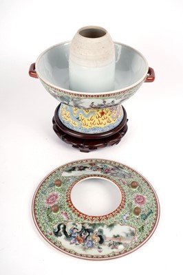 Lot 873 - A Chinese rose petal warmer and stand