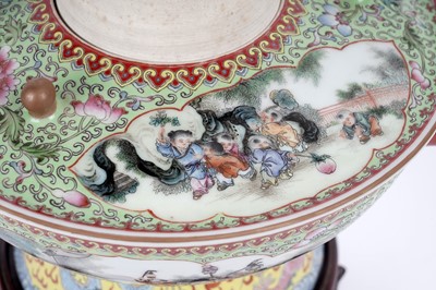 Lot 873 - A Chinese rose petal warmer and stand