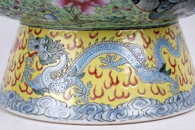 Lot 873 - A Chinese rose petal warmer and stand