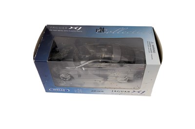 Lot 142 - A collection of diecast model cars, primarily scale 1:18 including: Corgi and Bburago